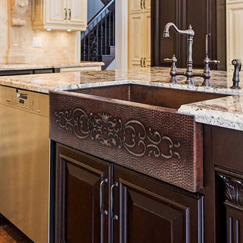 This is an example of a mediterranean kitchen in Seattle with a farmhouse sink.