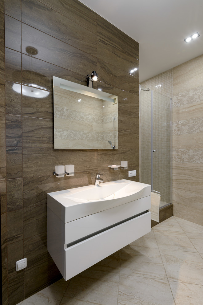 Inspiration for a large contemporary master bathroom in Novosibirsk with flat-panel cabinets, white cabinets, a corner tub, an alcove shower, a wall-mount toilet, beige tile, ceramic tile, beige walls, ceramic floors and a wall-mount sink.