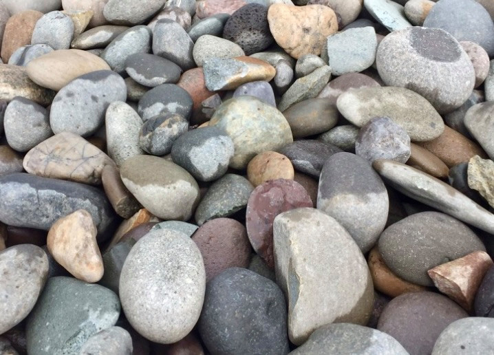 Help me with ideas to use a LOT of 4"6" river rocks in my yard