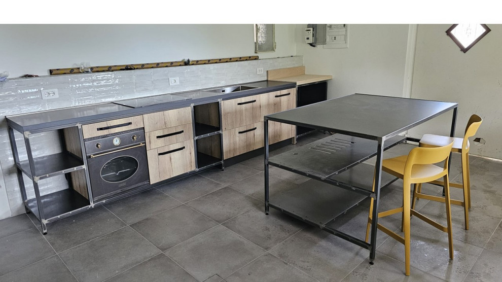 Progetto realizzato -La cucina della taverna