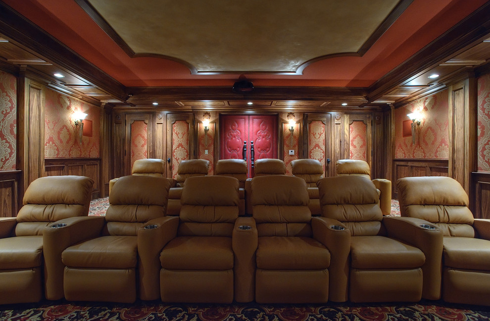 Inspiration for a large traditional enclosed home theatre in Chicago with carpet, multi-coloured walls and a built-in media wall.