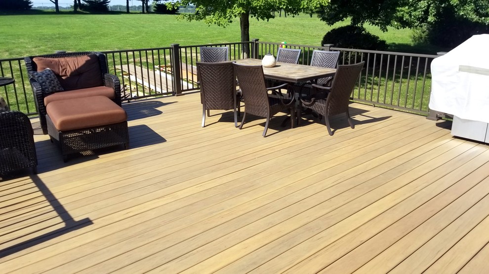 Photo of a large backyard deck in Other with no cover.