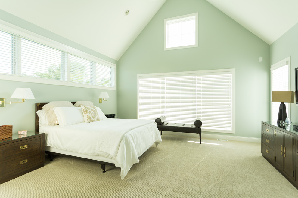 Design ideas for a large transitional master bedroom in Milwaukee with carpet, green walls and no fireplace.