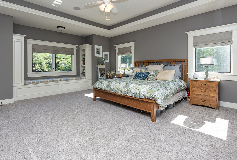 Example of a transitional bedroom design in Cedar Rapids