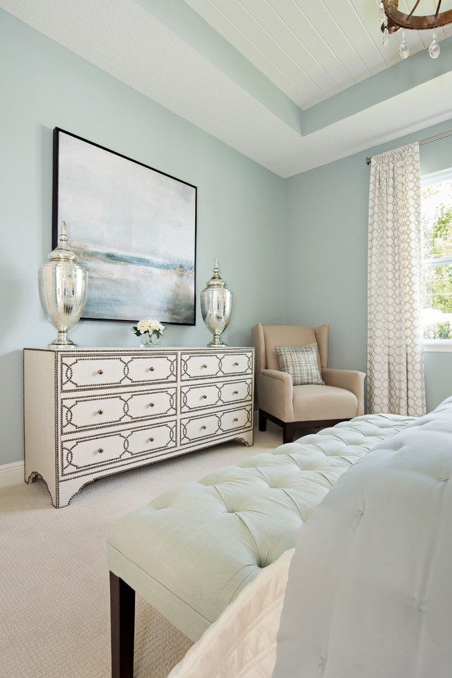 Inspiration for a transitional bedroom in Orlando with beige walls.