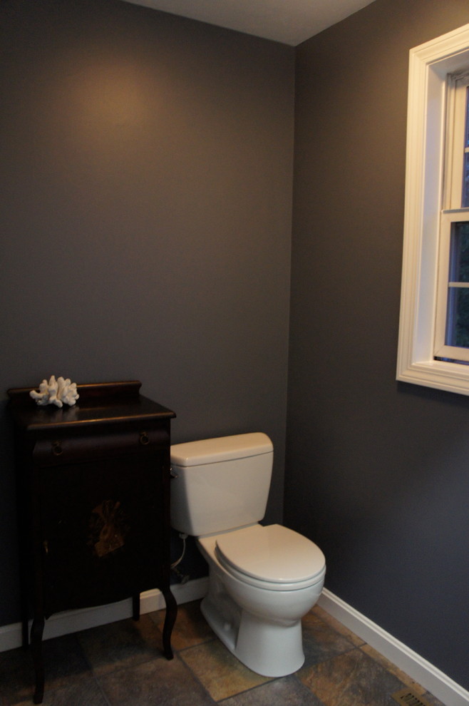 This is an example of a traditional powder room in Boston.