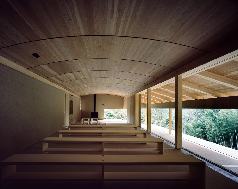 Example of a country home design design in Other