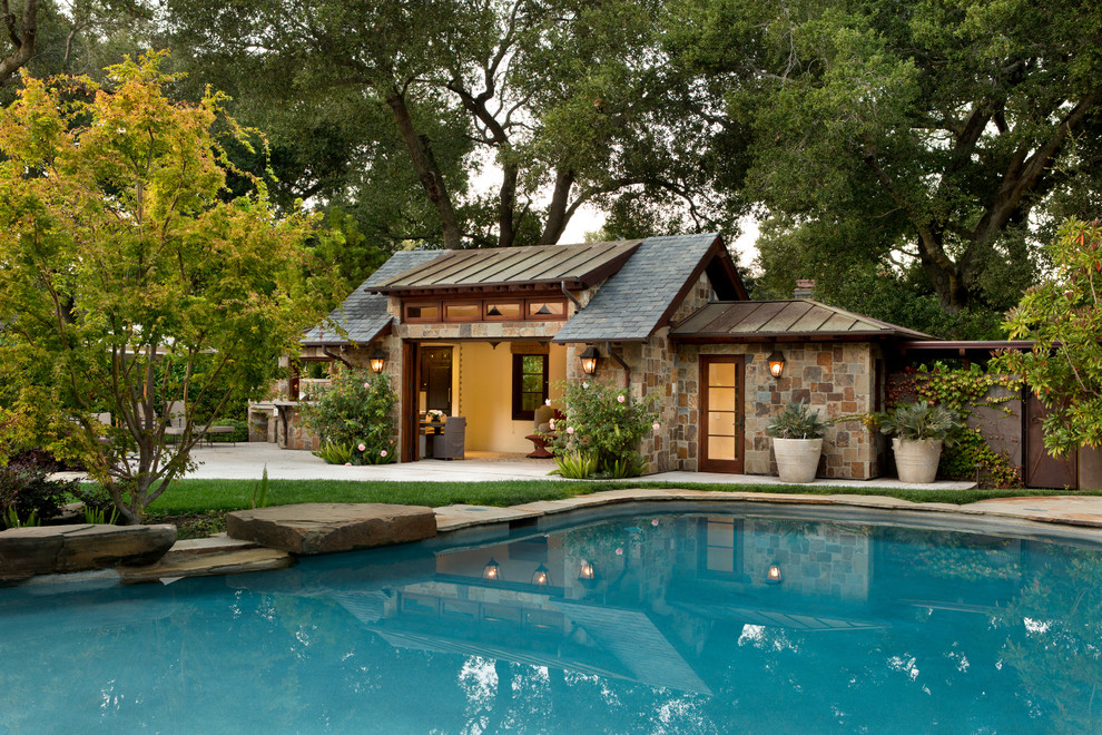 This is an example of a mediterranean custom-shaped pool in San Francisco with a pool house.