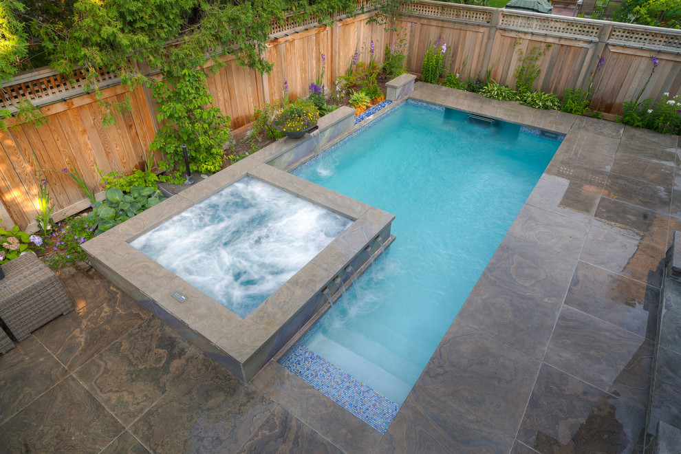 This is an example of a small traditional pool in Other.