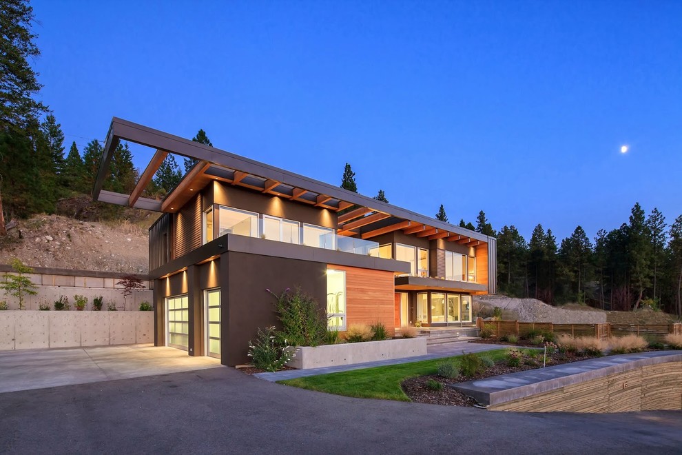 Design ideas for a contemporary exterior in Calgary with wood siding.
