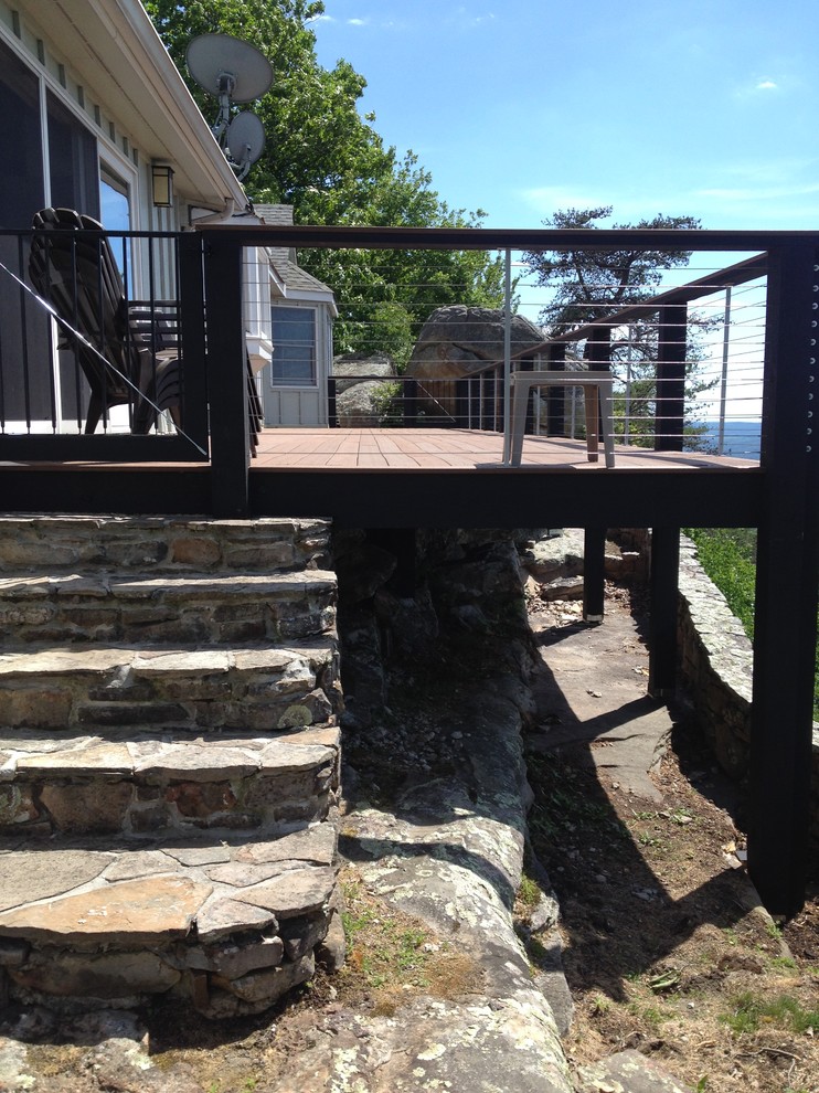 Deck - large contemporary backyard deck idea with no cover