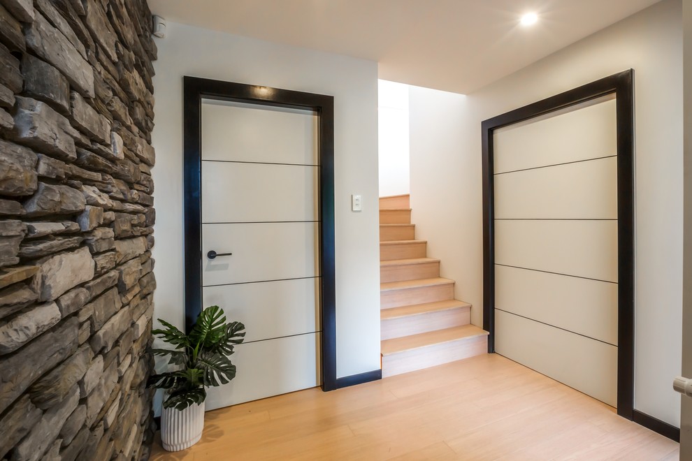 This is an example of a scandinavian hallway in Wellington with bamboo floors.