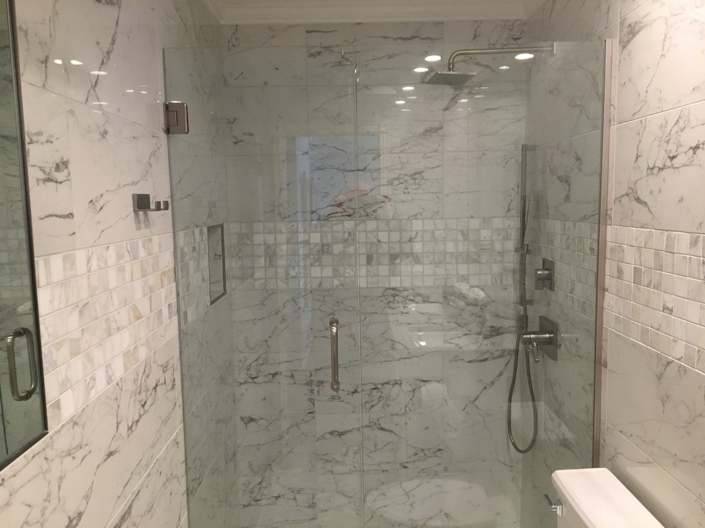Inspiration for a mid-sized transitional master bathroom in Other with raised-panel cabinets, white cabinets, a curbless shower, gray tile, white tile, marble, grey walls, marble floors, a console sink, granite benchtops, grey floor, a hinged shower door and grey benchtops.