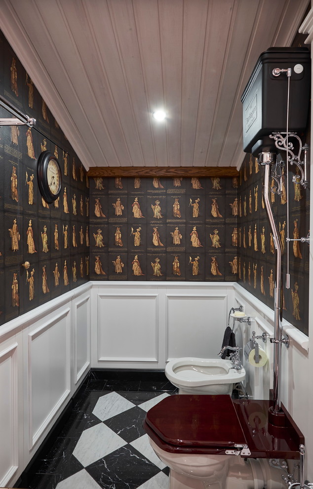 Photo of a traditional powder room in Other with a two-piece toilet, black walls and multi-coloured floor.