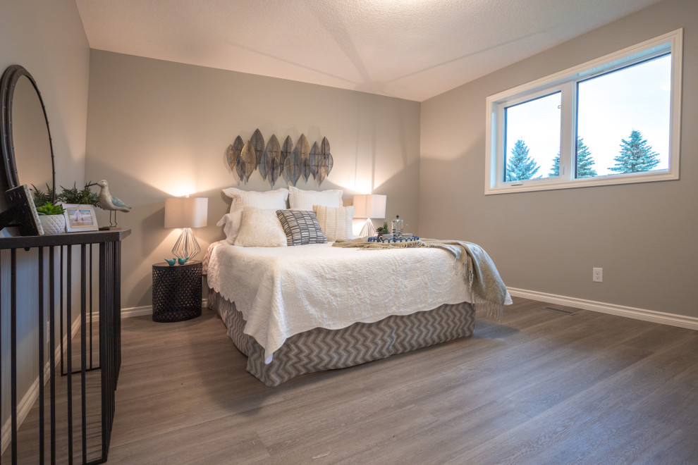 Photo of a mid-sized arts and crafts master bedroom in Other with grey walls, vinyl floors and grey floor.