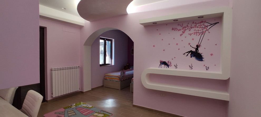 Large modern gender neutral children’s room in Other with purple walls and porcelain flooring.