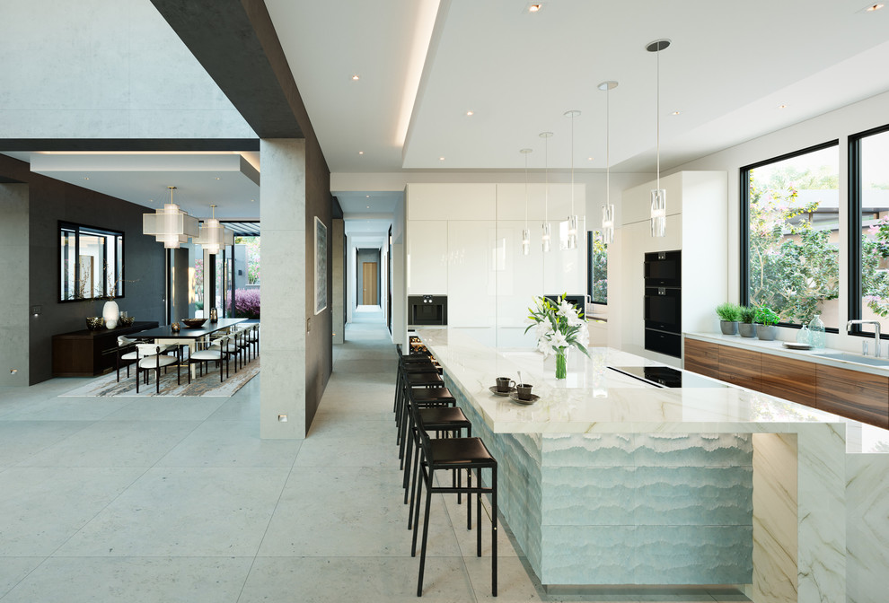 Photo of an expansive contemporary kitchen in Miami with a single-bowl sink, flat-panel cabinets, white cabinets, window splashback, black appliances, with island, grey floor and white benchtop.