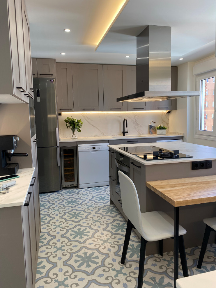 Large transitional u-shaped porcelain tile and multicolored floor enclosed kitchen photo in Other with an undermount sink, beaded inset cabinets, pink cabinets, marble countertops, white backsplash, marble backsplash, colored appliances, two islands and white countertops