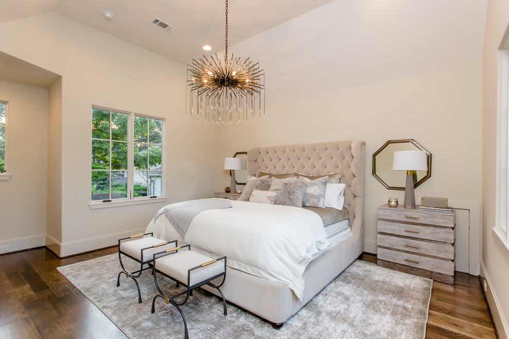 Design ideas for a mid-sized transitional master bedroom in Houston with beige walls and dark hardwood floors.