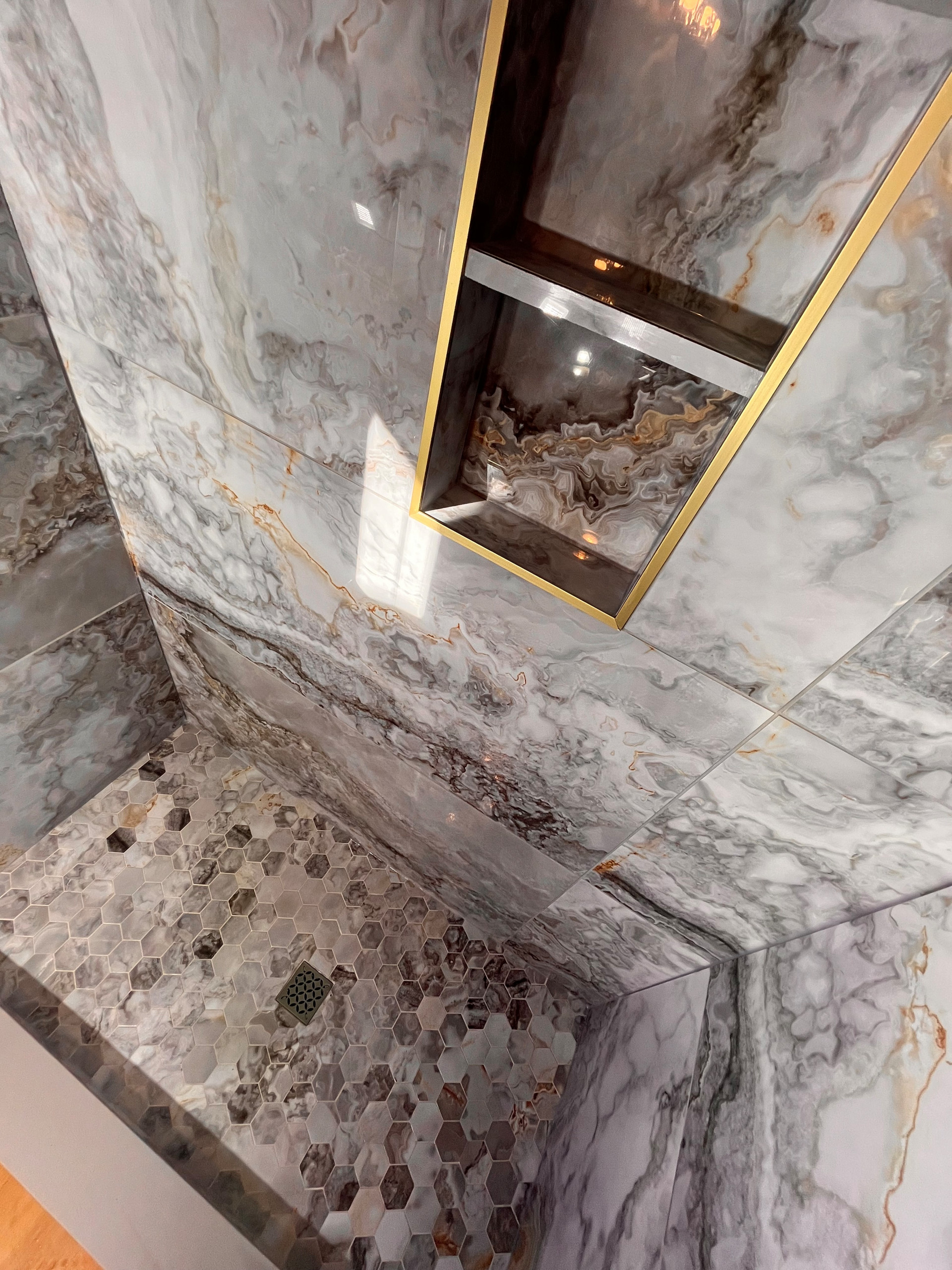 Shower reniovation: Gianni Griggio polished porcelain tile 24 x 48