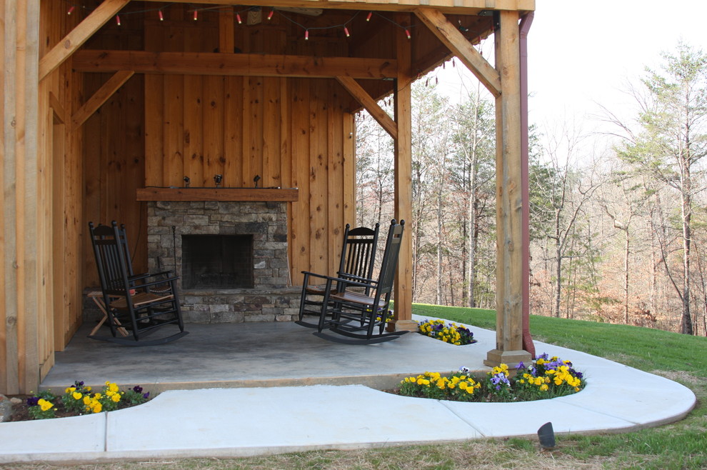 Country patio in Other with a fire feature.