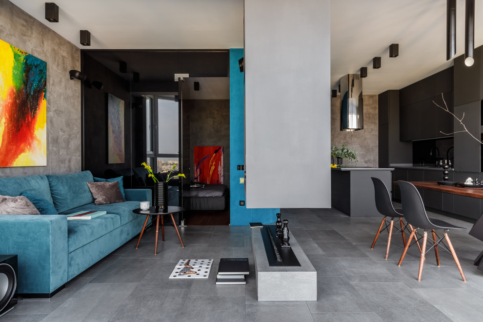 This is an example of a contemporary formal open concept living room in Moscow with grey walls, a two-sided fireplace and grey floor.