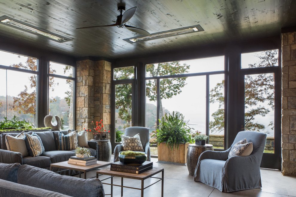 Design ideas for a large country sunroom in Nashville with concrete floors and grey floor.