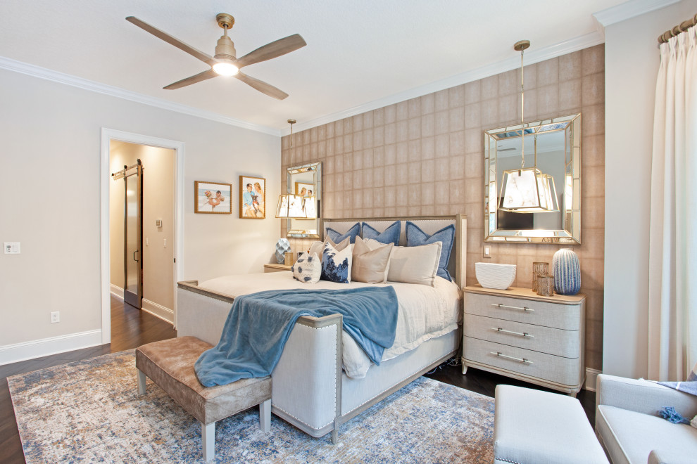 Photo of a medium sized traditional master bedroom in Jacksonville with beige walls, dark hardwood flooring, no fireplace, brown floors and wallpapered walls.