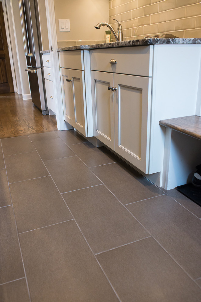 Example of a transitional laundry room design in Chicago