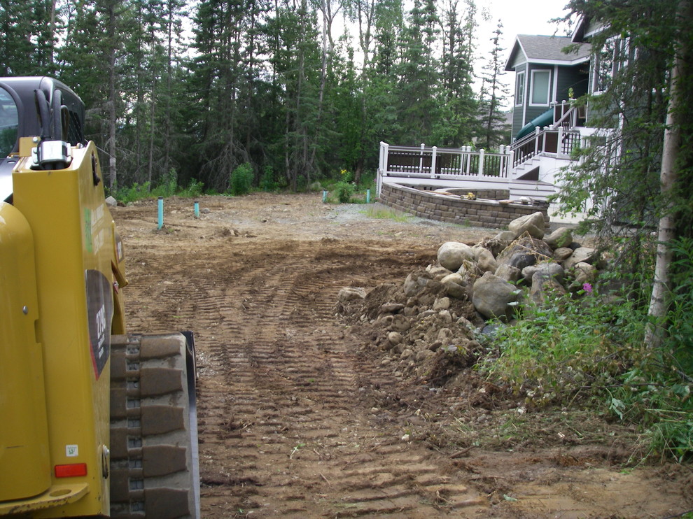 Photo of a transitional stone landscaping.