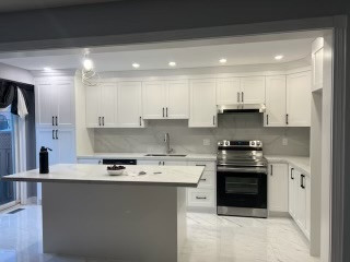 Minimalist kitchen photo in Toronto
