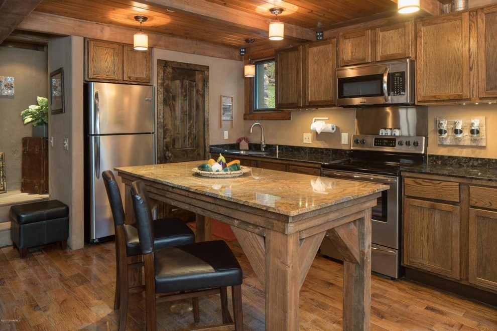 Example of a mountain style kitchen design in Phoenix