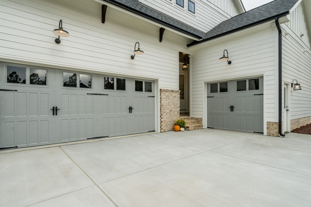This is an example of a country attached three-car garage in Raleigh.