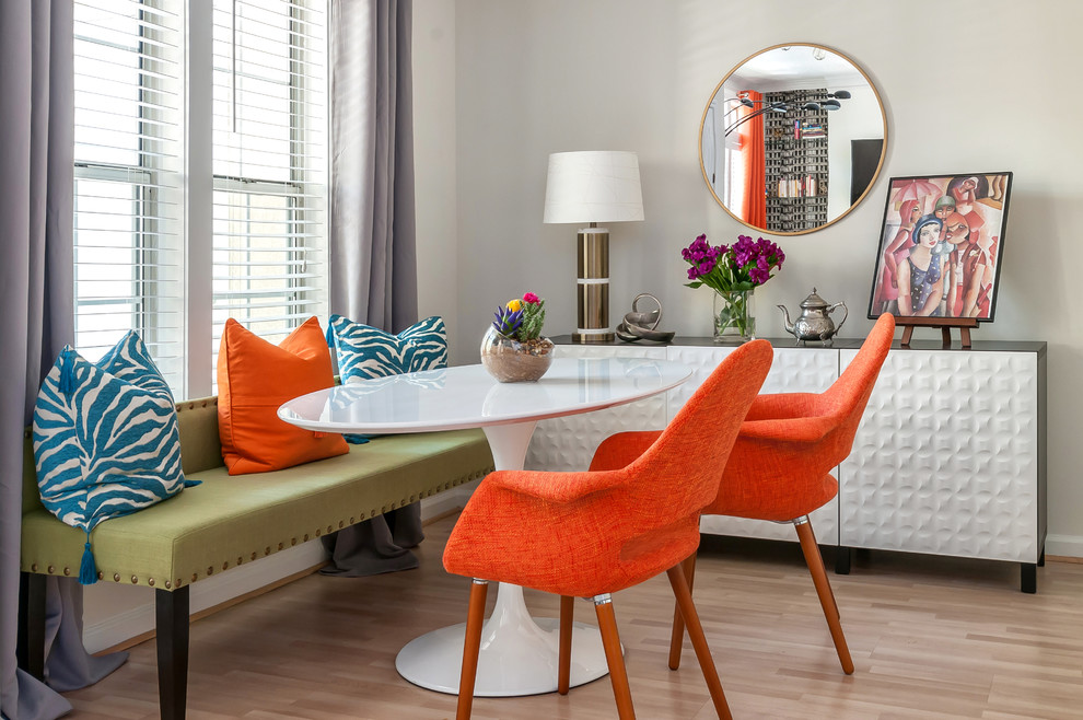 Example of a small transitional light wood floor kitchen/dining room combo design in Atlanta with white walls and no fireplace