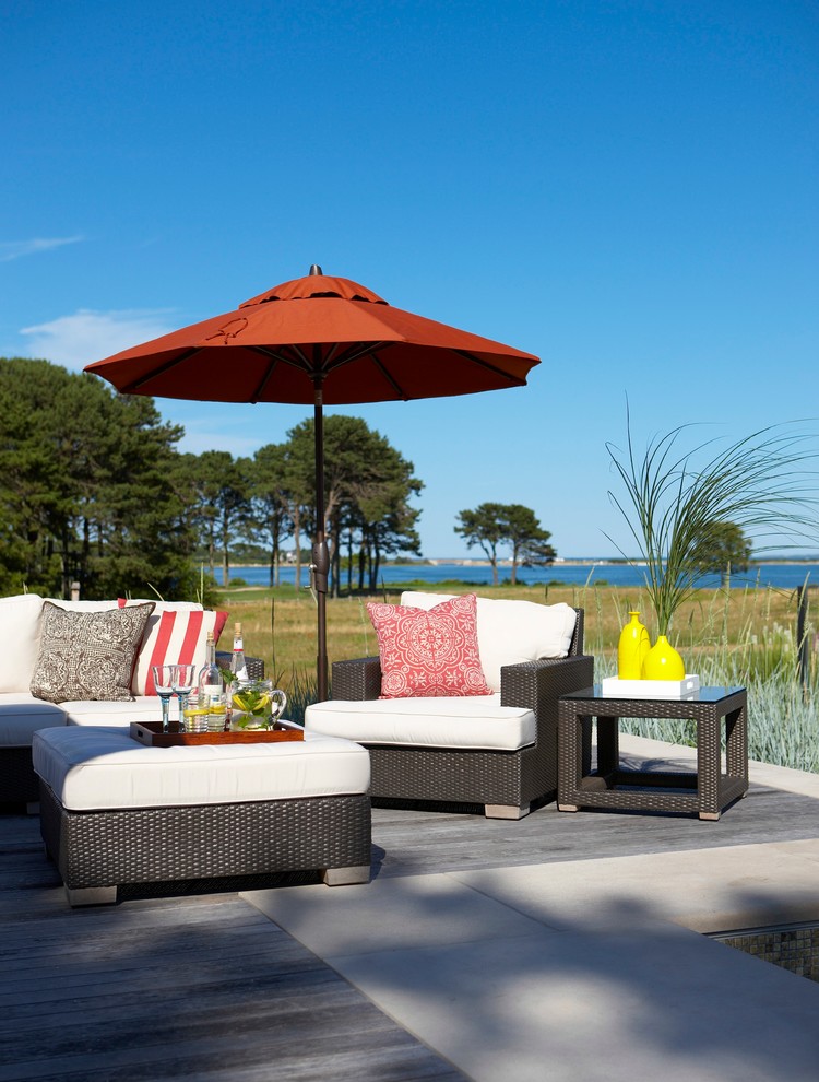 Inspiration for a mid-sized beach style backyard deck in Boston.