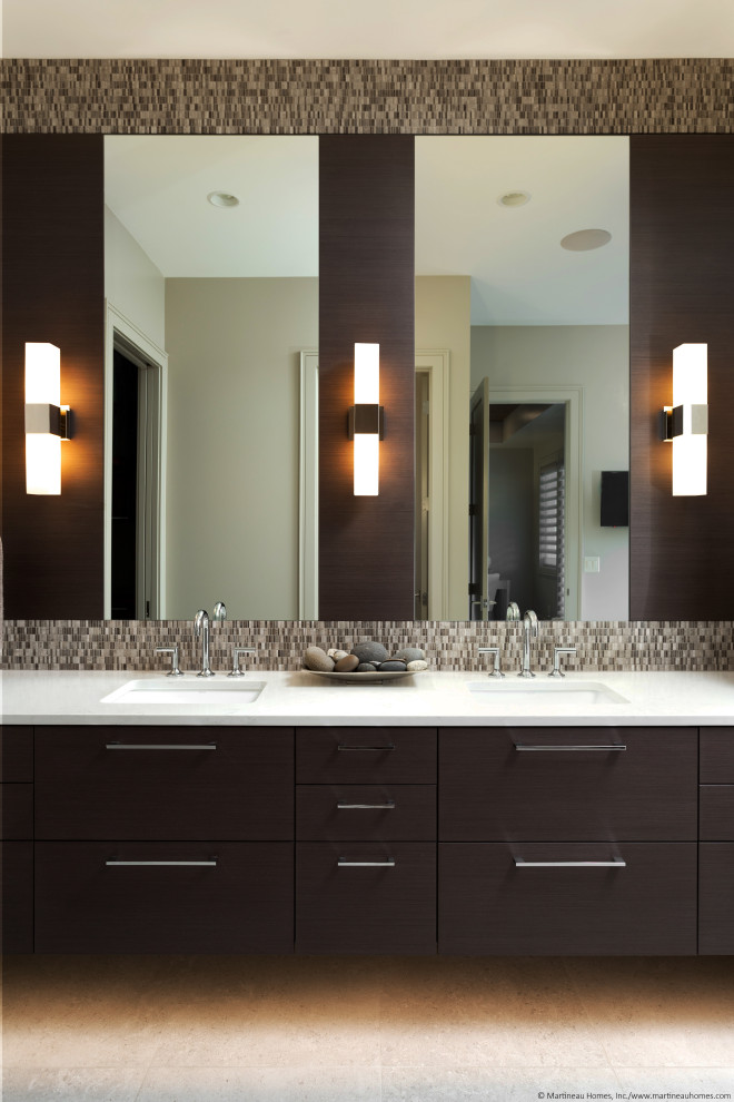 This is an example of a large modern master bathroom in Salt Lake City with flat-panel cabinets, dark wood cabinets, multi-coloured tile, ceramic floors, a drop-in sink, beige floor, white benchtops, a double vanity, a built-in vanity and wood walls.