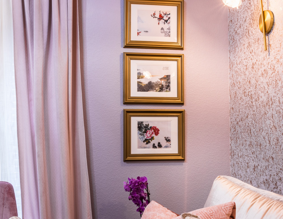 Photo of a mid-sized asian guest bedroom in Dallas with purple walls, carpet, beige floor, vaulted and wallpaper.