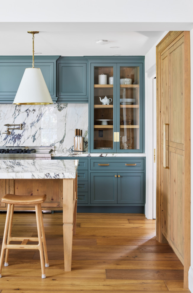 Example of a transitional kitchen design in Toronto