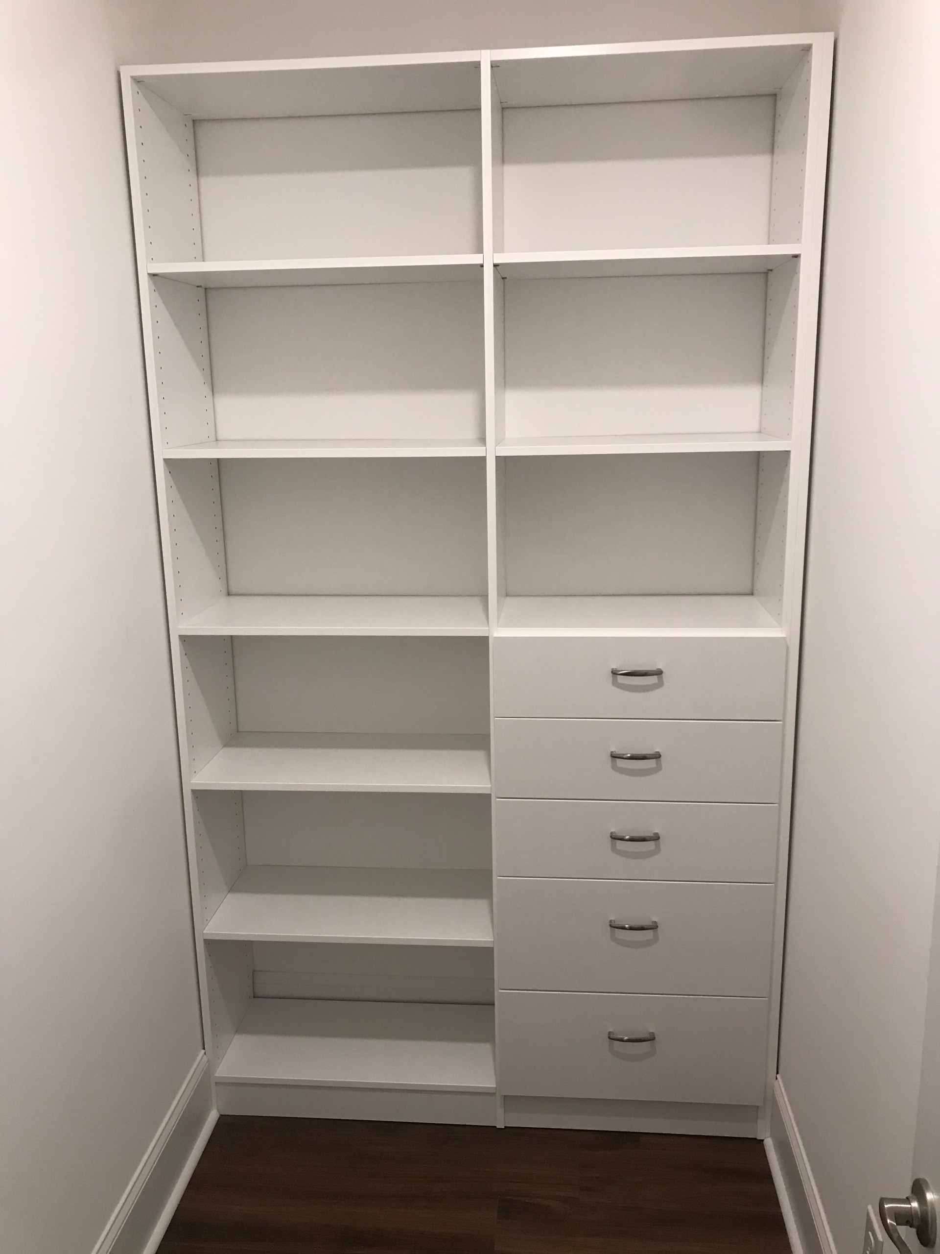 Small Primary Closet with Open Shelving and Drawers