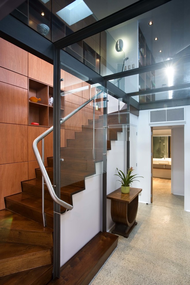 Photo of a contemporary wood staircase in Auckland with wood risers.