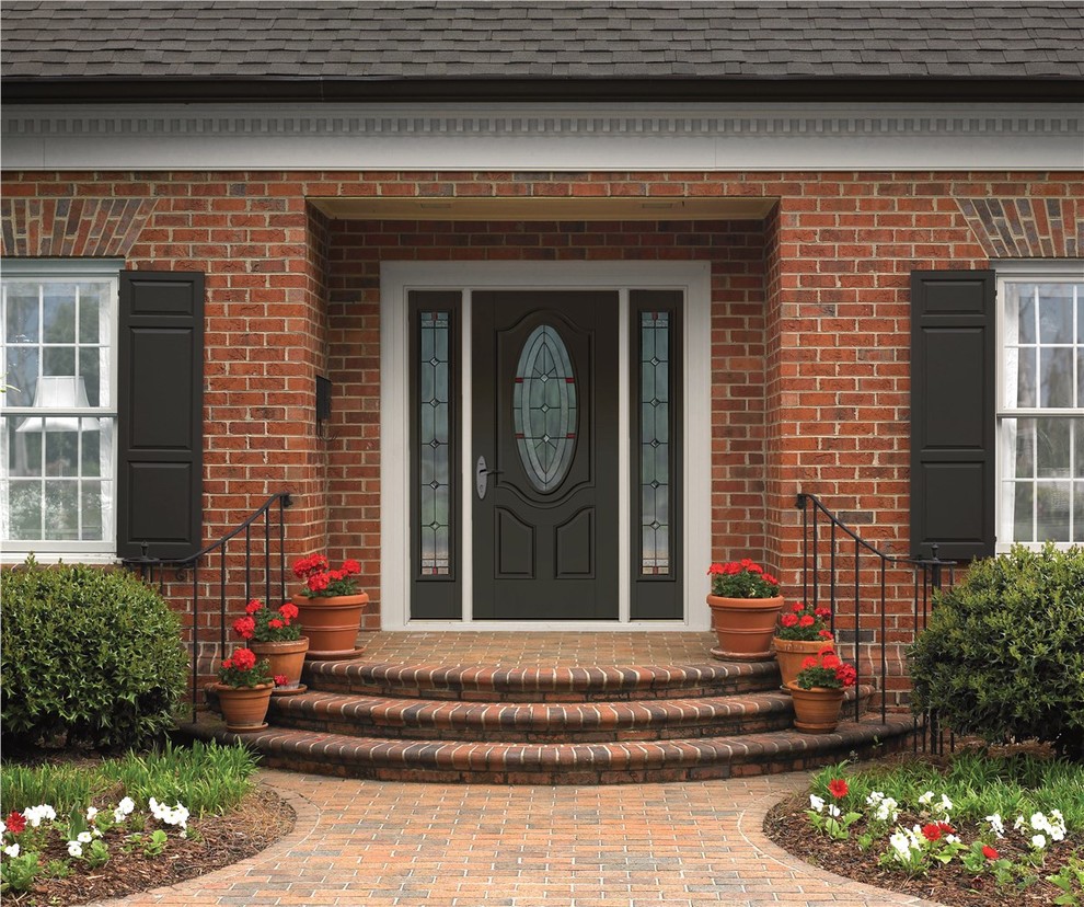 Design ideas for a mid-sized traditional front door in Omaha with a single front door and a black front door.