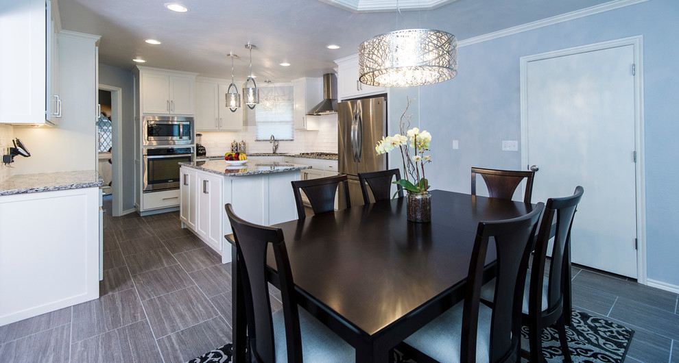 Mid-sized transitional kitchen/dining combo in Oklahoma City with grey walls and porcelain floors.