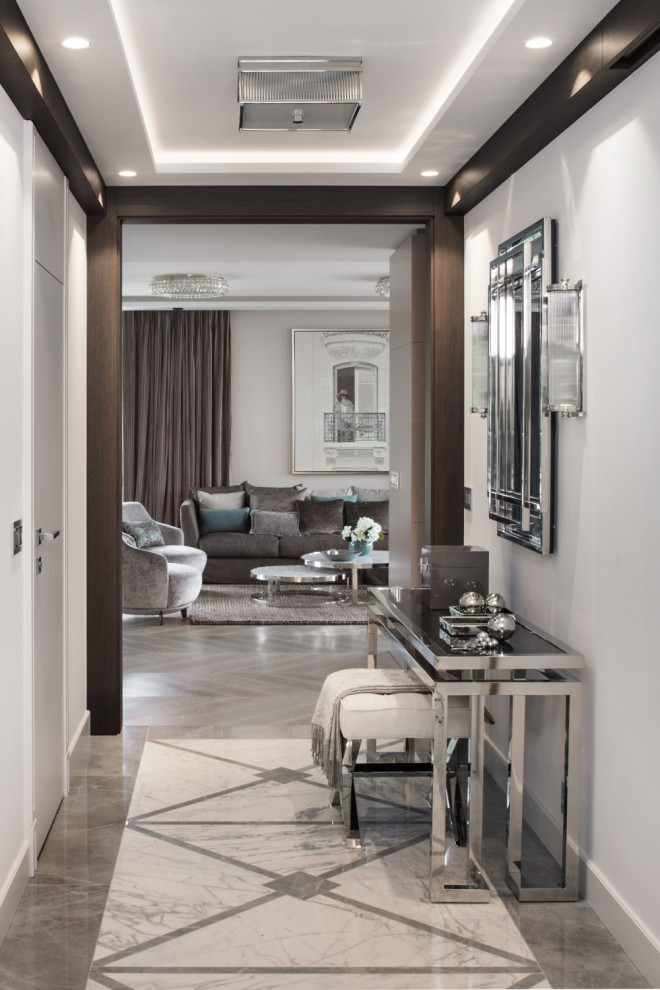 Design ideas for a large contemporary hallway in Other with grey walls, marble floors and grey floor.