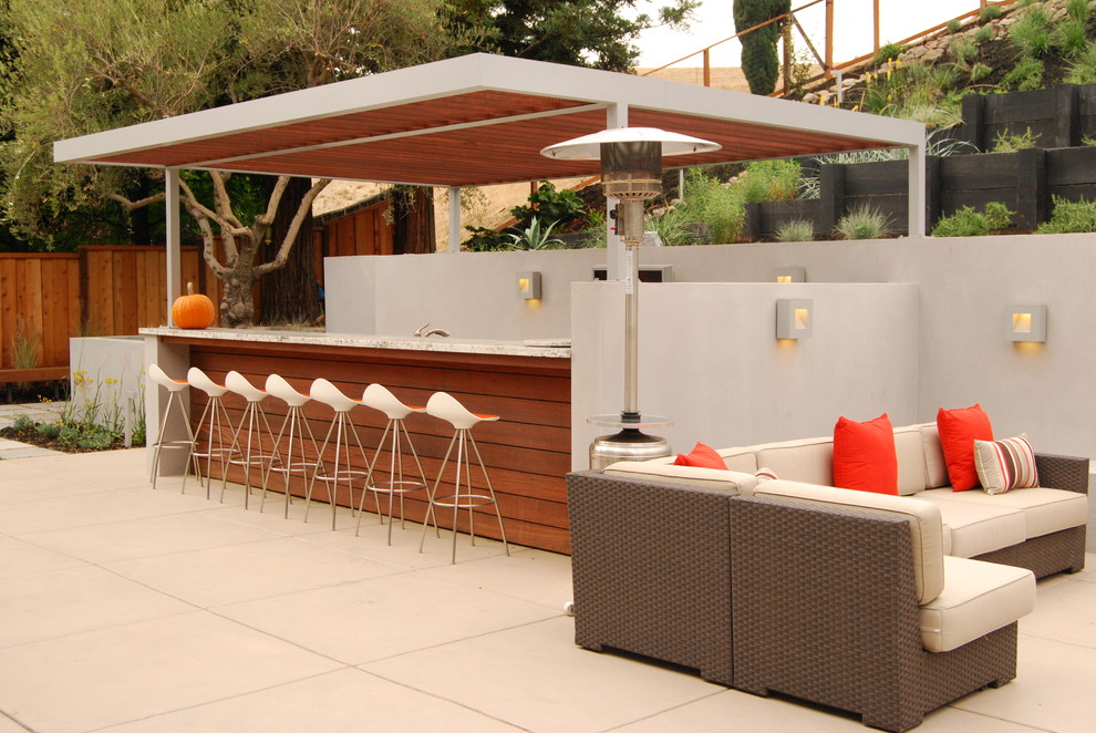 Design ideas for a mid-sized contemporary backyard patio in San Francisco with concrete pavers.