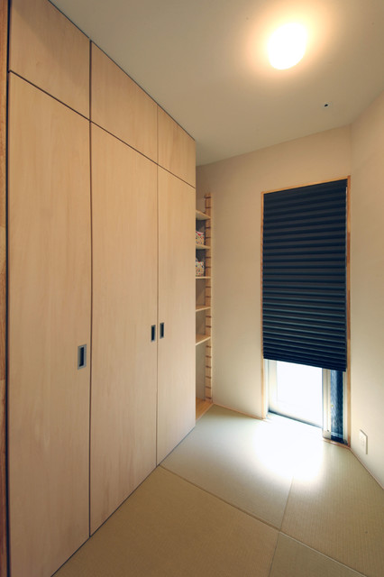中庭のある無垢な珪藻土の家 scandinave-salle-de-sejour