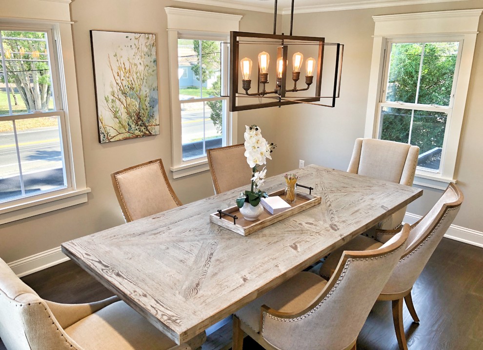 Mid-sized transitional dark wood floor and brown floor dining room photo with gray walls