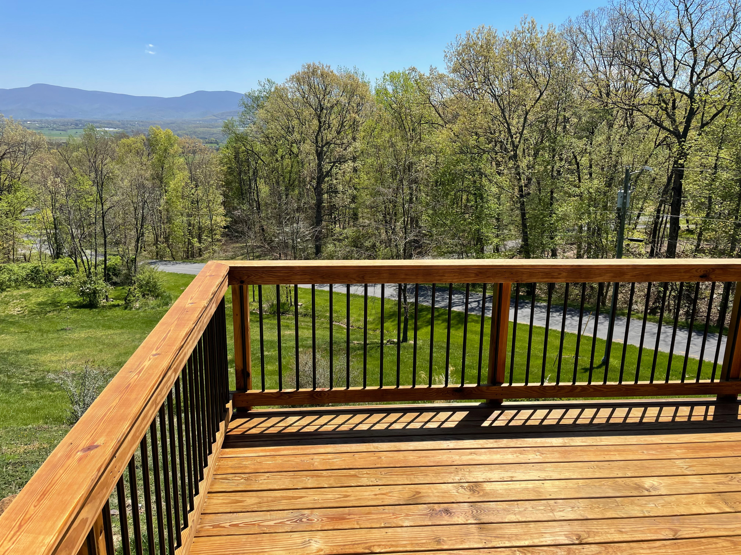 Deck stain and gutters powerwash