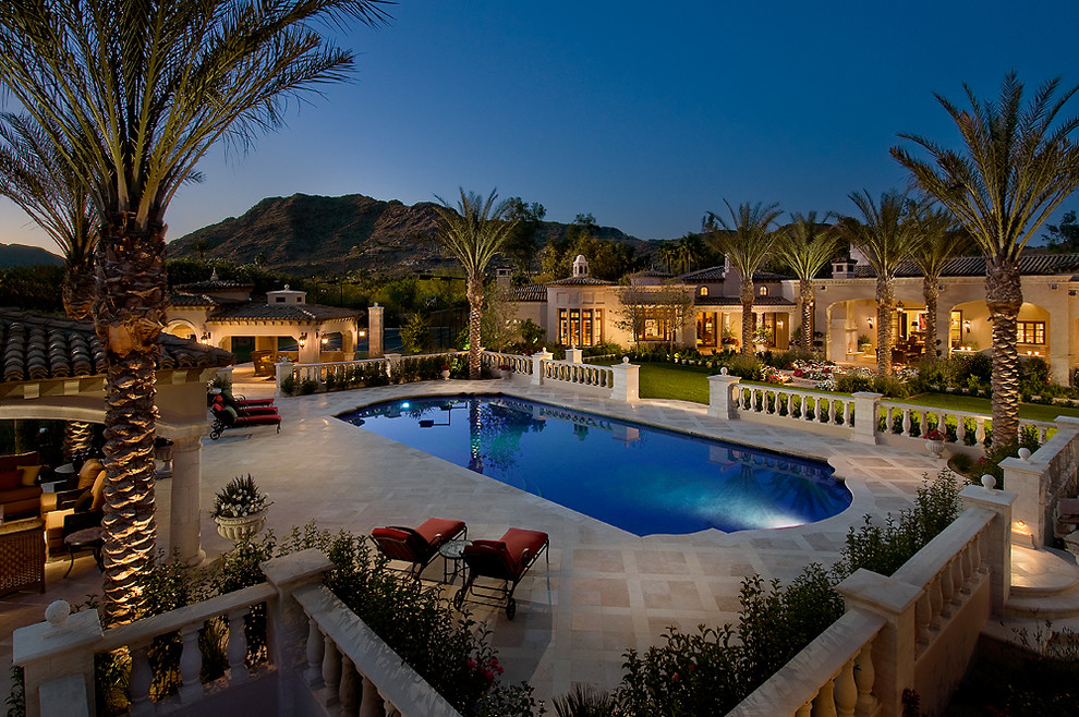 Inspiration for an expansive mediterranean rectangular pool in Phoenix.