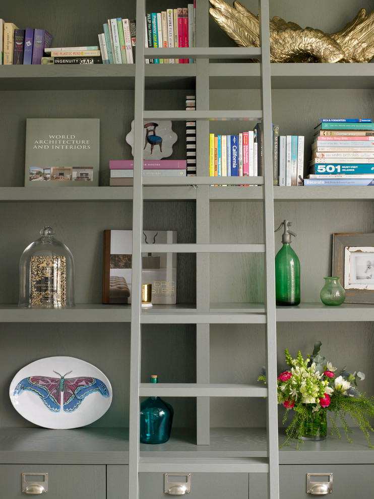 Medium sized eclectic study in London with grey walls, light hardwood flooring and beige floors.