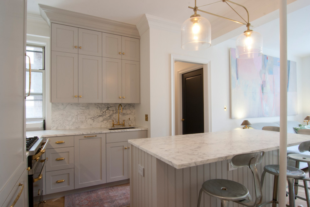 Example of a transitional kitchen design in New York